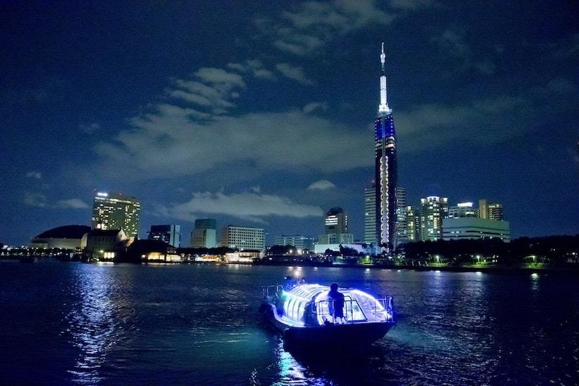 Sleek city views from the Water Bus at night